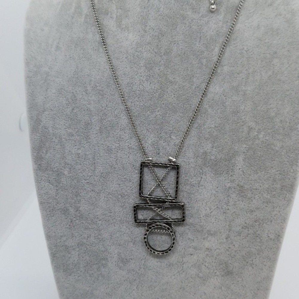 Abstract silver tone necklace